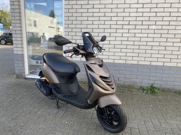 LEUKE PIAGGIO ZIP 2P 45KM BROM MAT BRUIN BJ2011 5000KM